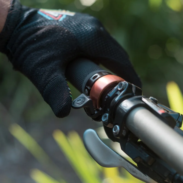 Knog Oi Classic Bike Bell (thumb use)