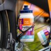 Elite Fly NSN Pro Cycling Team Water Bottles on bike